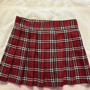 Spirit Halloween red, black, and white plaid pleated skirt Sz xs/sm